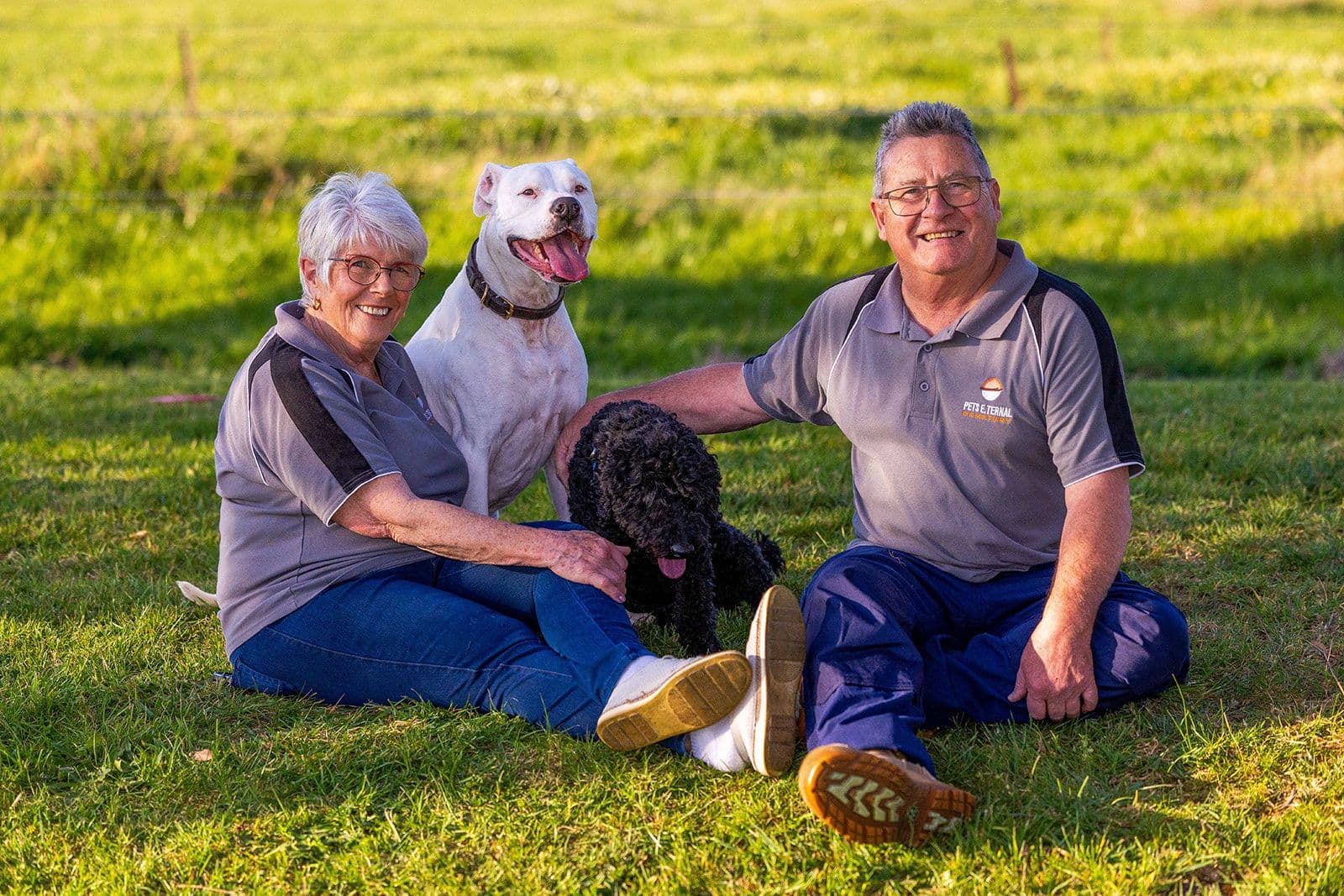 Terry and Karen Ryan with their dogs at Pets E. Ternal Cemetery
